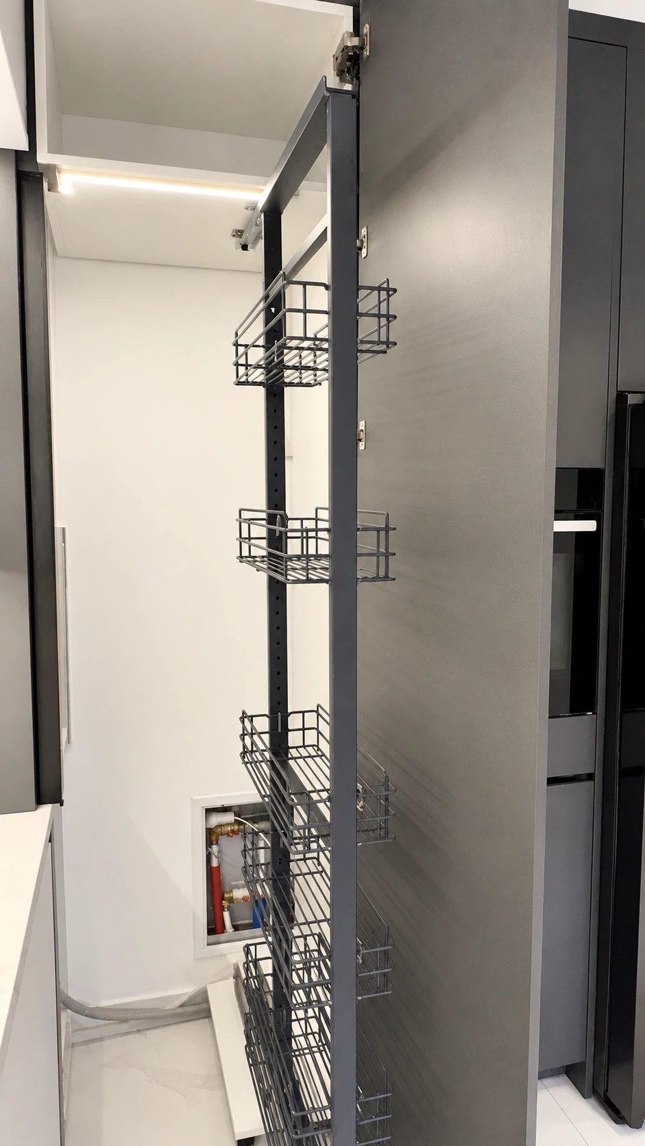 Tall pullout system and valve access